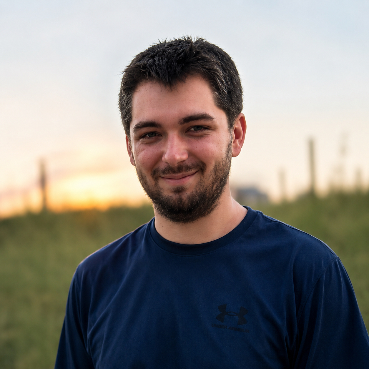 Portrait of Samuel Deason outdoors at sunset
